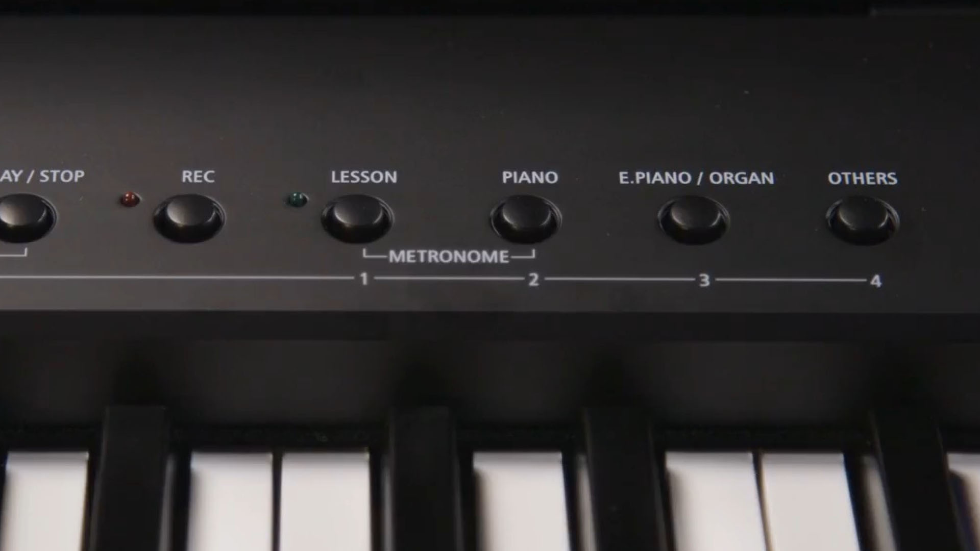 A digital piano with mechanical buttons